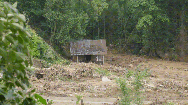 67歲村會計謝輝全在特大暴雨中用一通電話救下村民後失聯，其遺體已於今日上午被找到